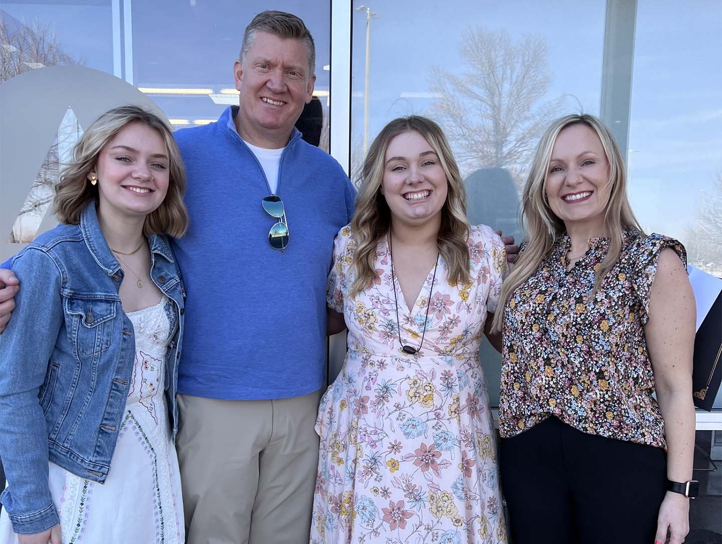 Happy family smiling outdoors