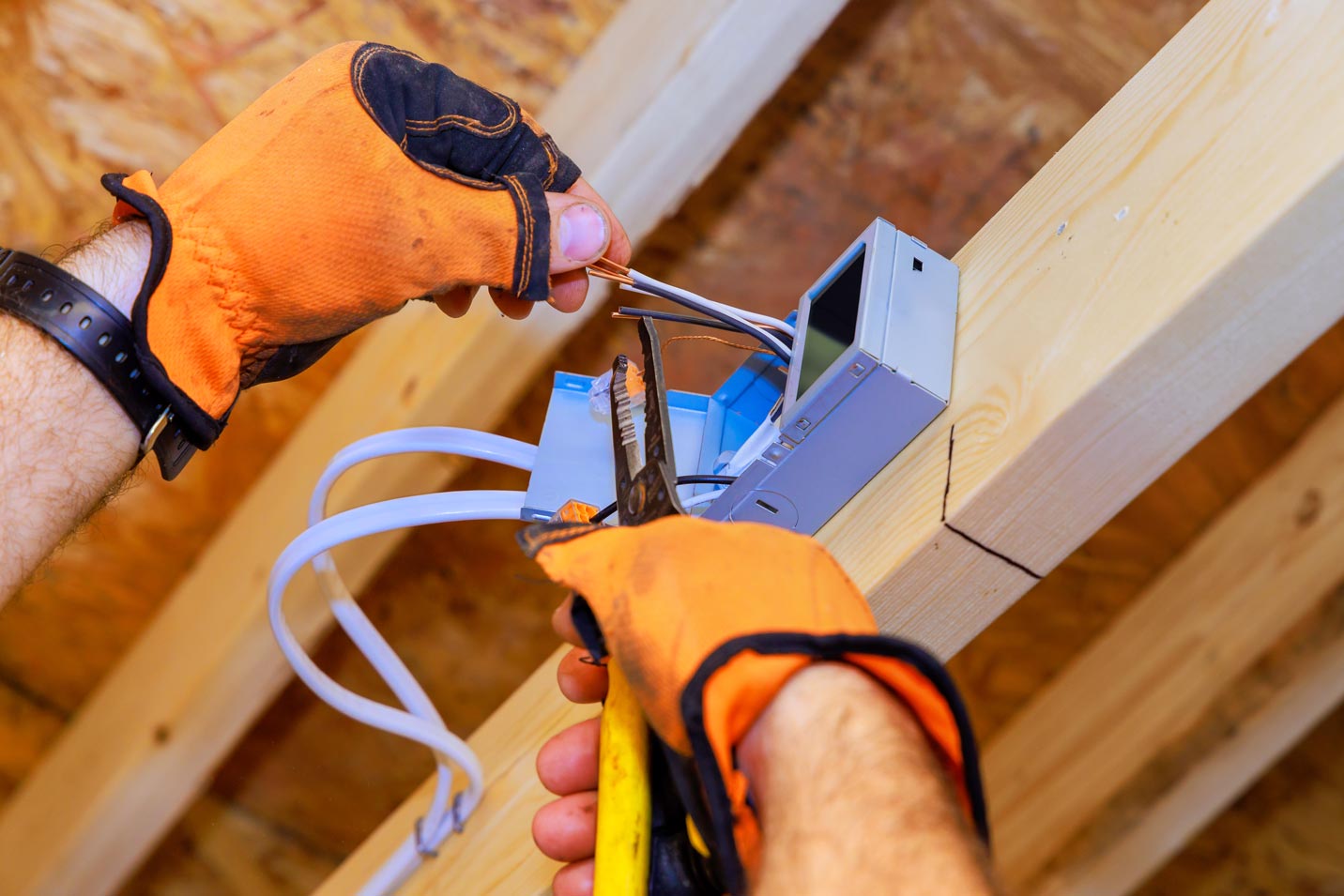 New home construction: installation of recessed ceiling lights with LEDs