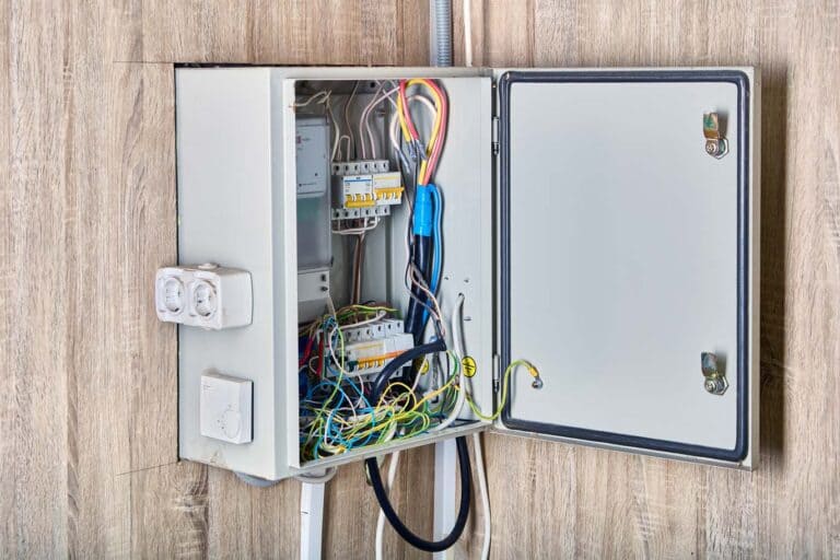 An electrical panel sits neatly in a wall cabinet, installed by Coffin Electric in Grimes, IA.
